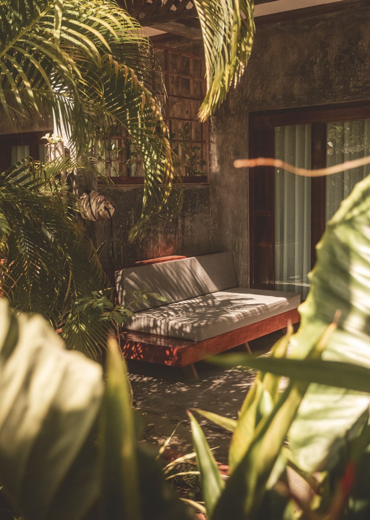 Private room terrace lounge with tropical garden